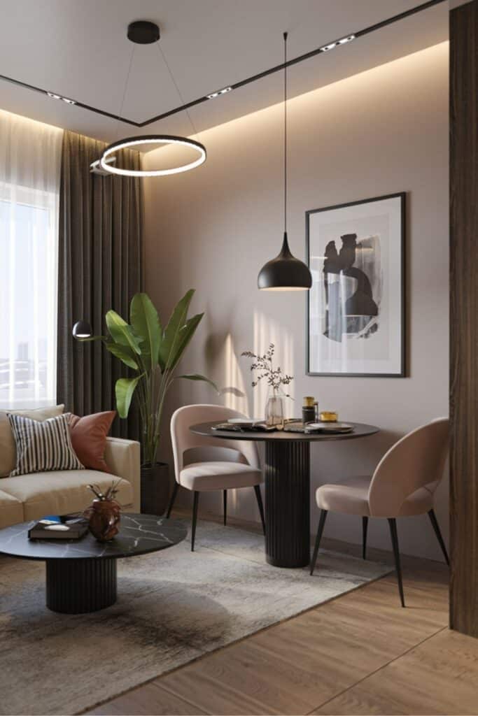 Small living room dining room combo with a urban chic design, featuring compact furniture and thoughtful details.