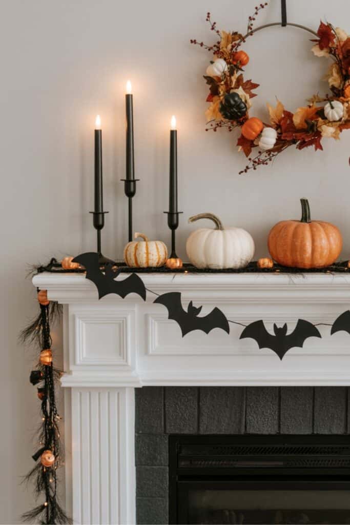 Simple Halloween Fireplace Mantel With Bat Garland