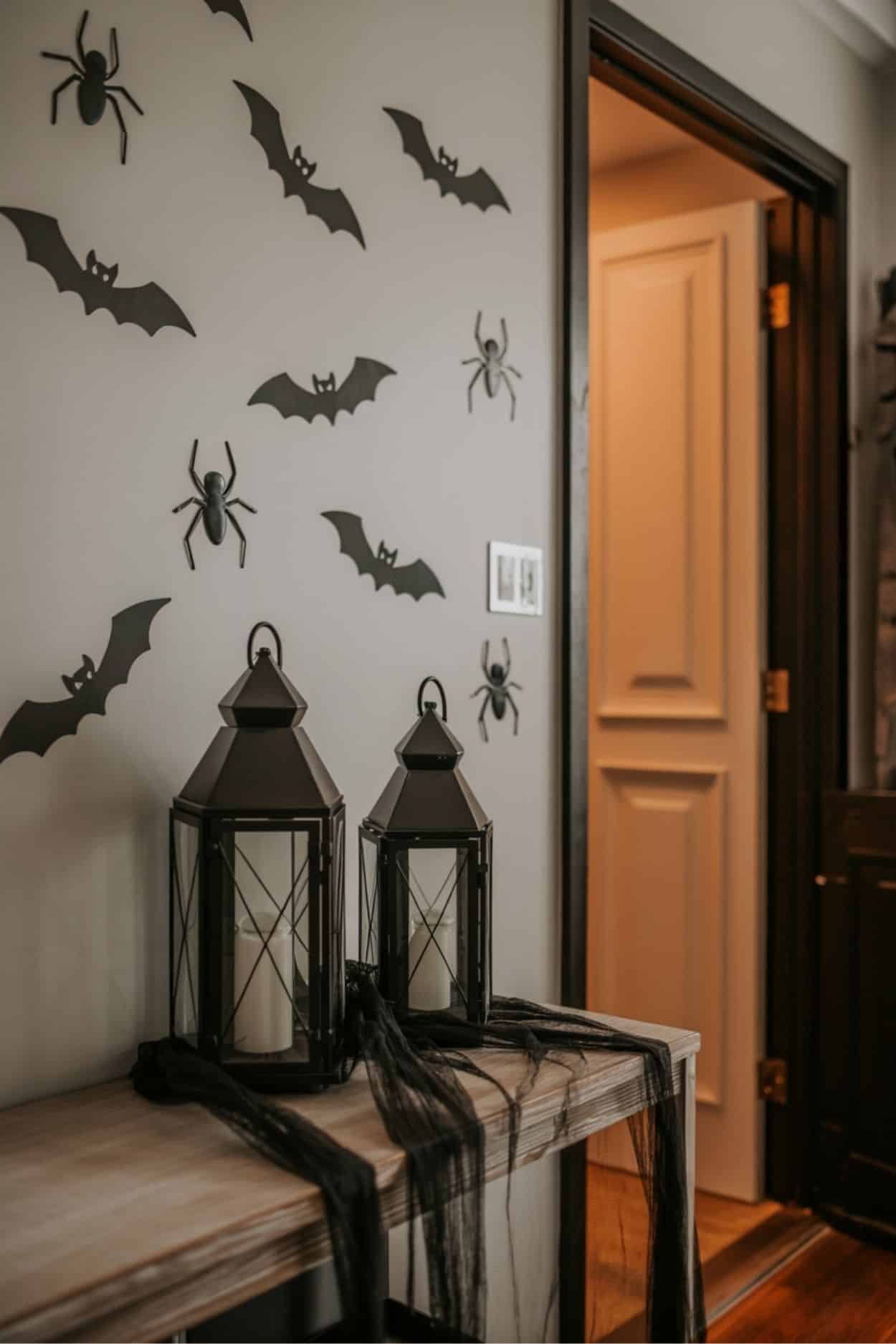 black fabric draped on entryway table for halloween
